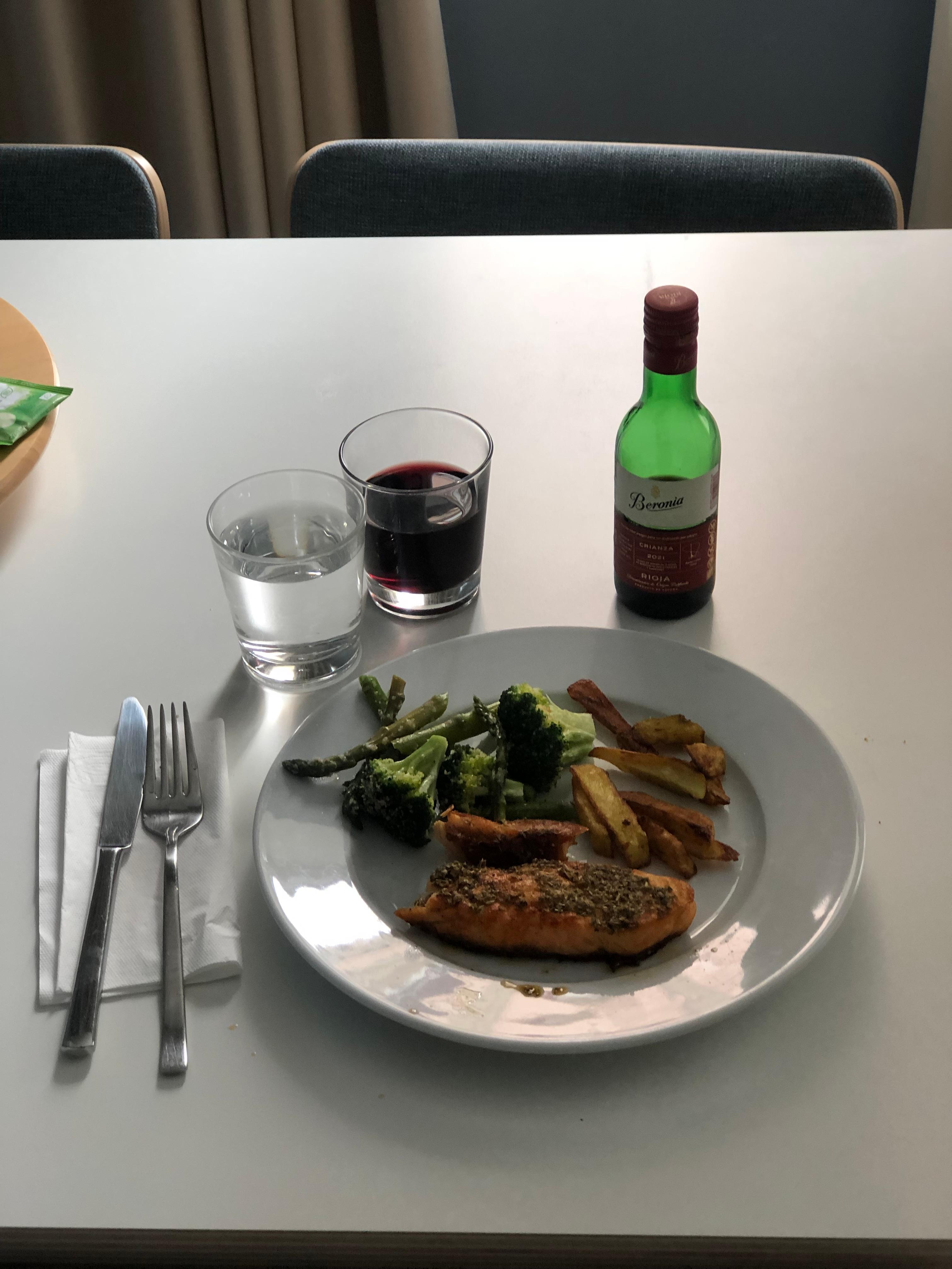 The apartment had all of the cookware and dishes needed to cook own meals. 