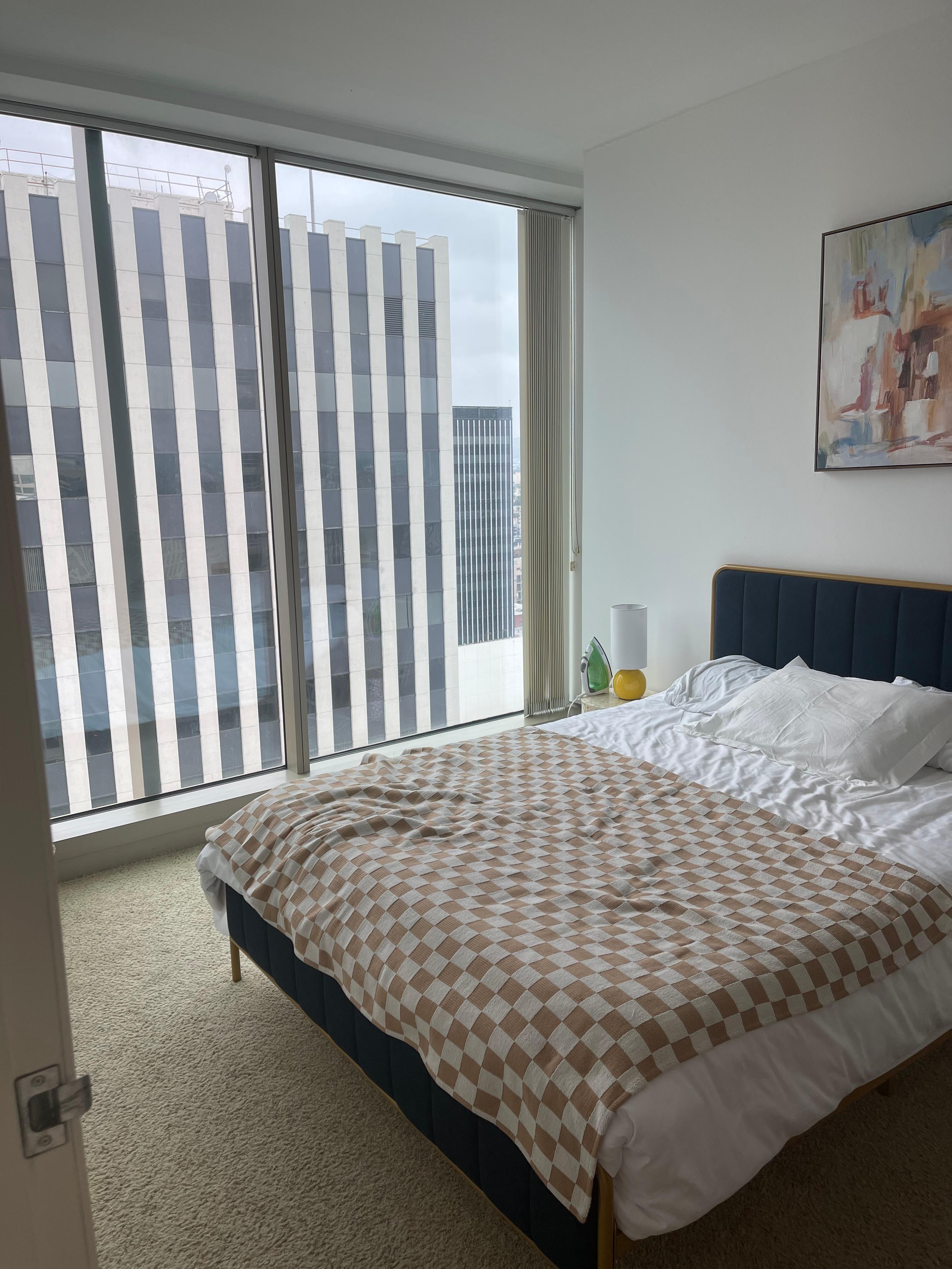 Bedroom with the building blocking view