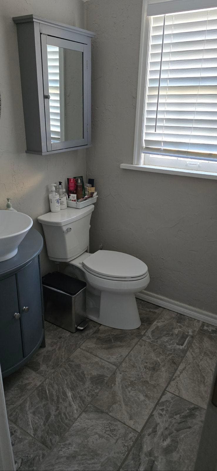 Cute bath, with lots of amenities.