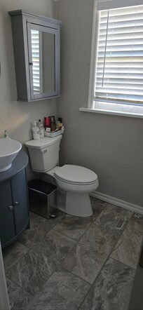 Cute bath, with lots of amenities.