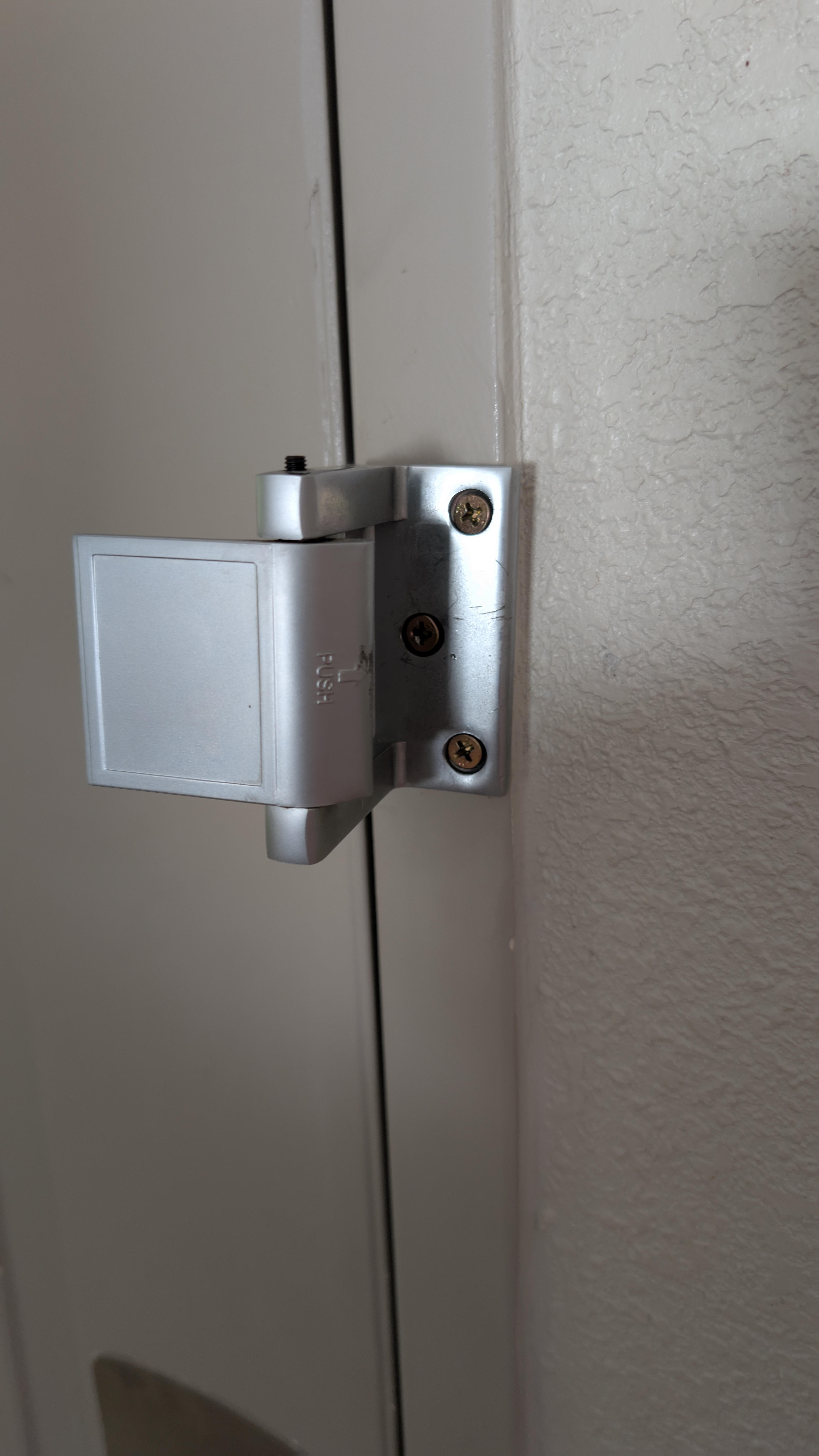 Security latch was not firmly screwed down