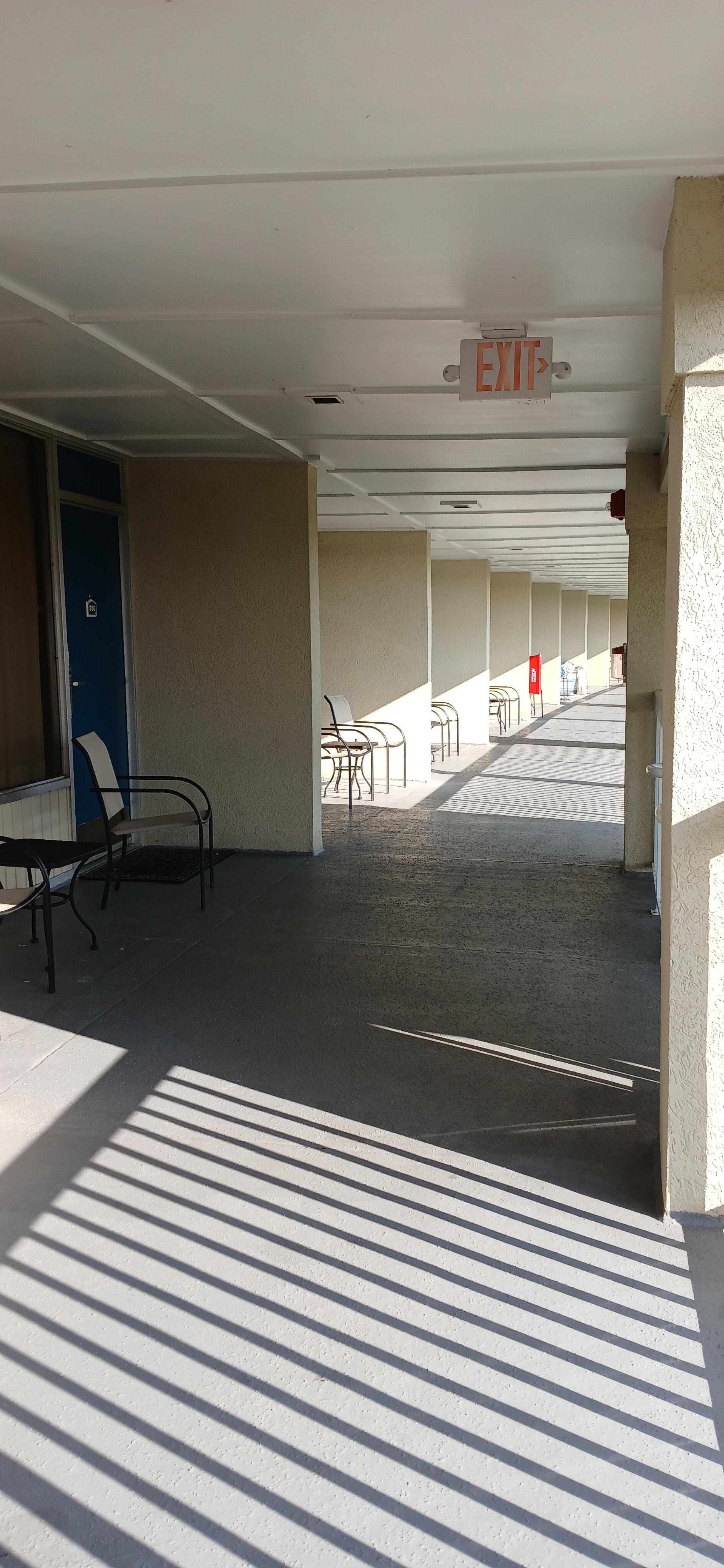 Open balcony, not private,  everyone must walk past each other's cove.