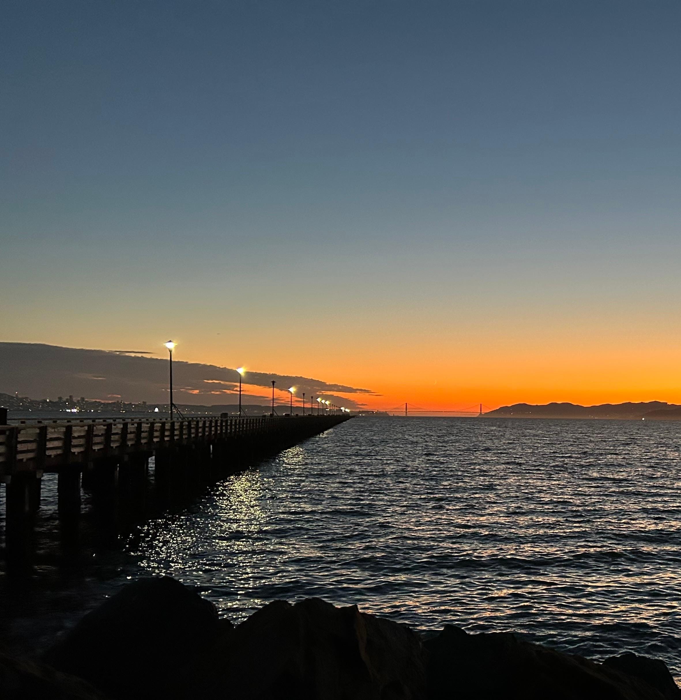 A sunset view of the Golden Gate Bridge from the Berkeley Marina. 