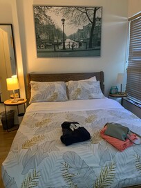 Queen bed with 4 pillows; comfortable