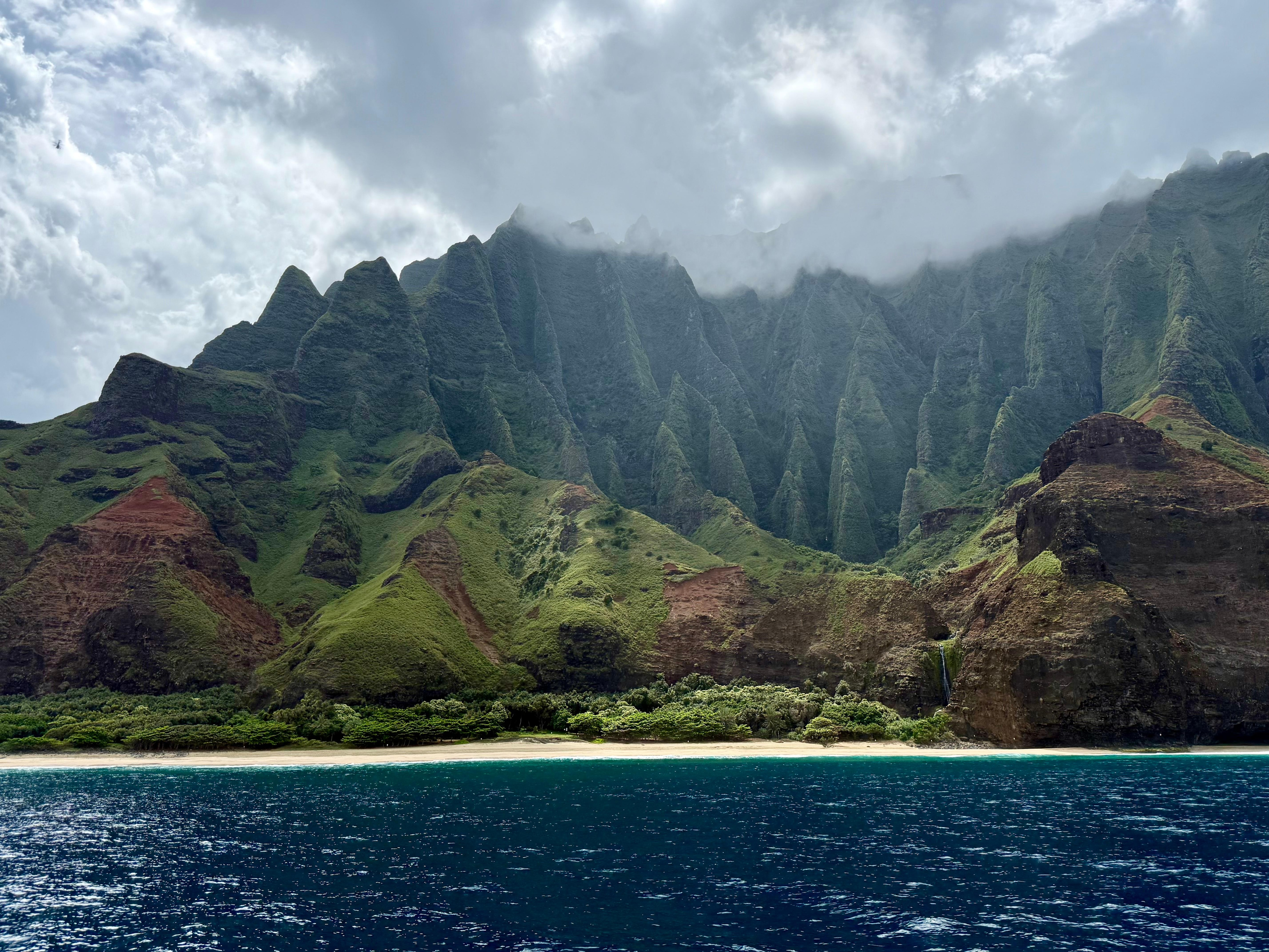 Views of the Nāpali coast from our boat snorkel/sail tour. 