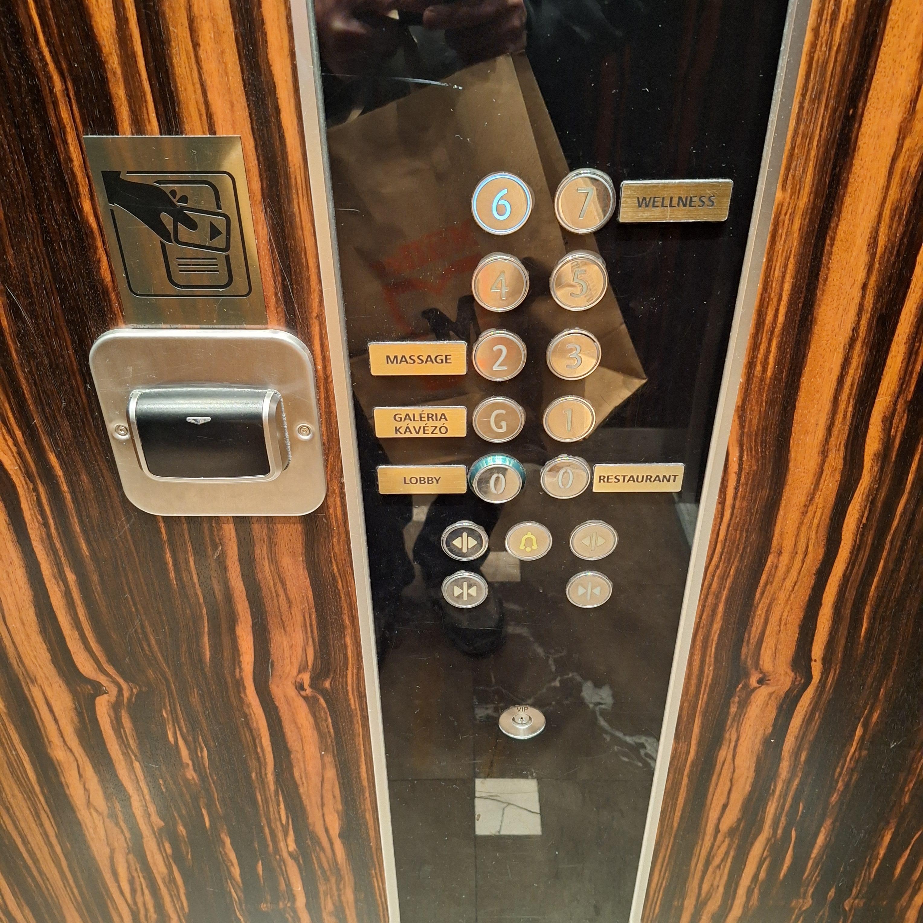 The elevator is room key locked.  Also, one elevator has the option of two different doors. One opens to the lobby. And the other toward the restaurant.   