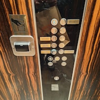 The elevator is room key locked. Also, one elevator has the option of two different doors. One opens to the lobby. And the other toward the restaurant.