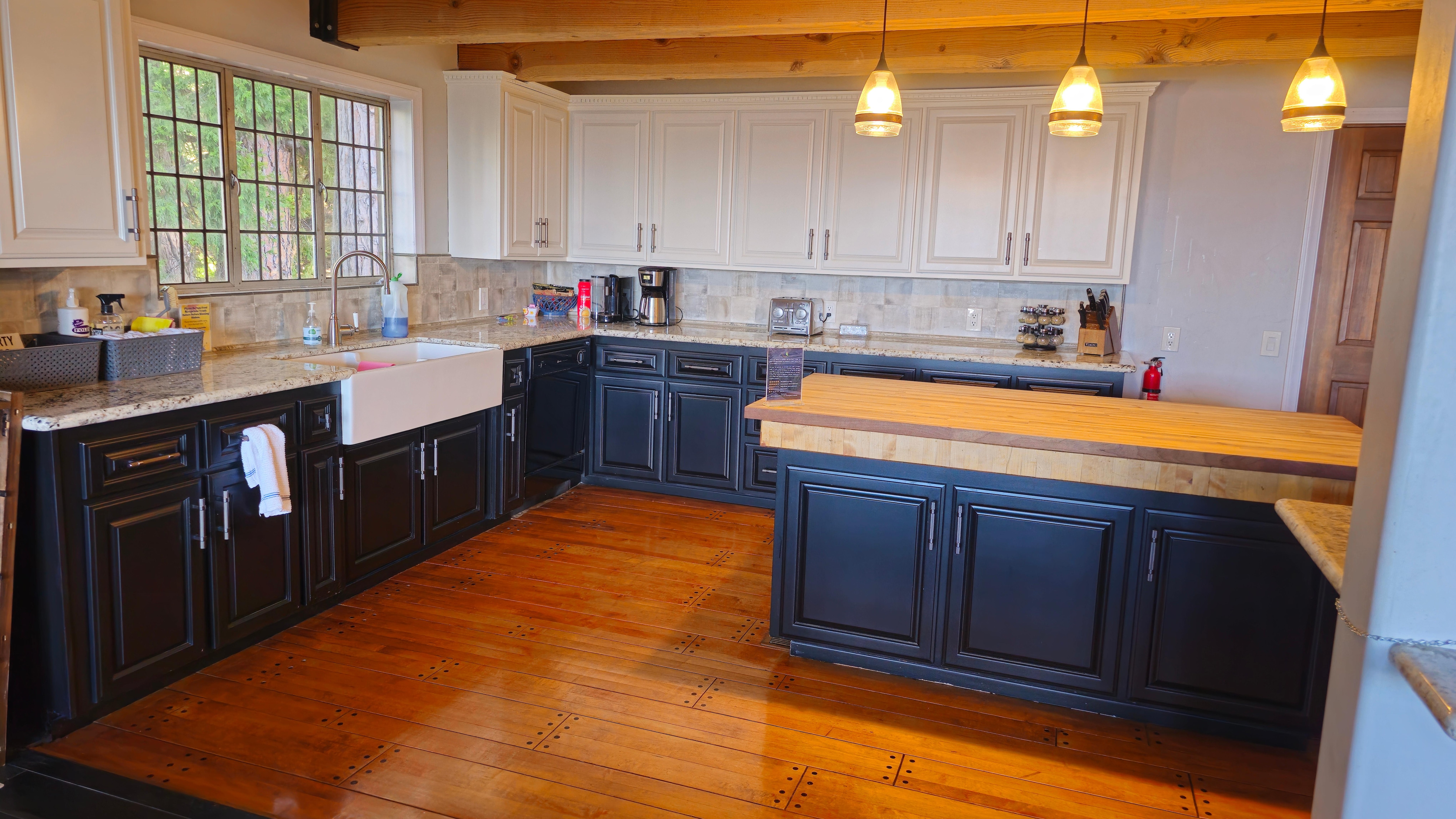 The kitchen is large with plenty of room to prepare meals. Plenty of dishware and kitchen tools and gadgets.