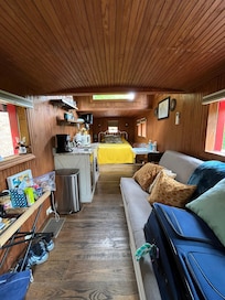 Caboose bedroom and kitchenette