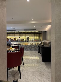 The cofffe area, the buffet needs a little more variety