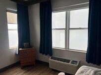 Frost film on the windows blocking view of alley