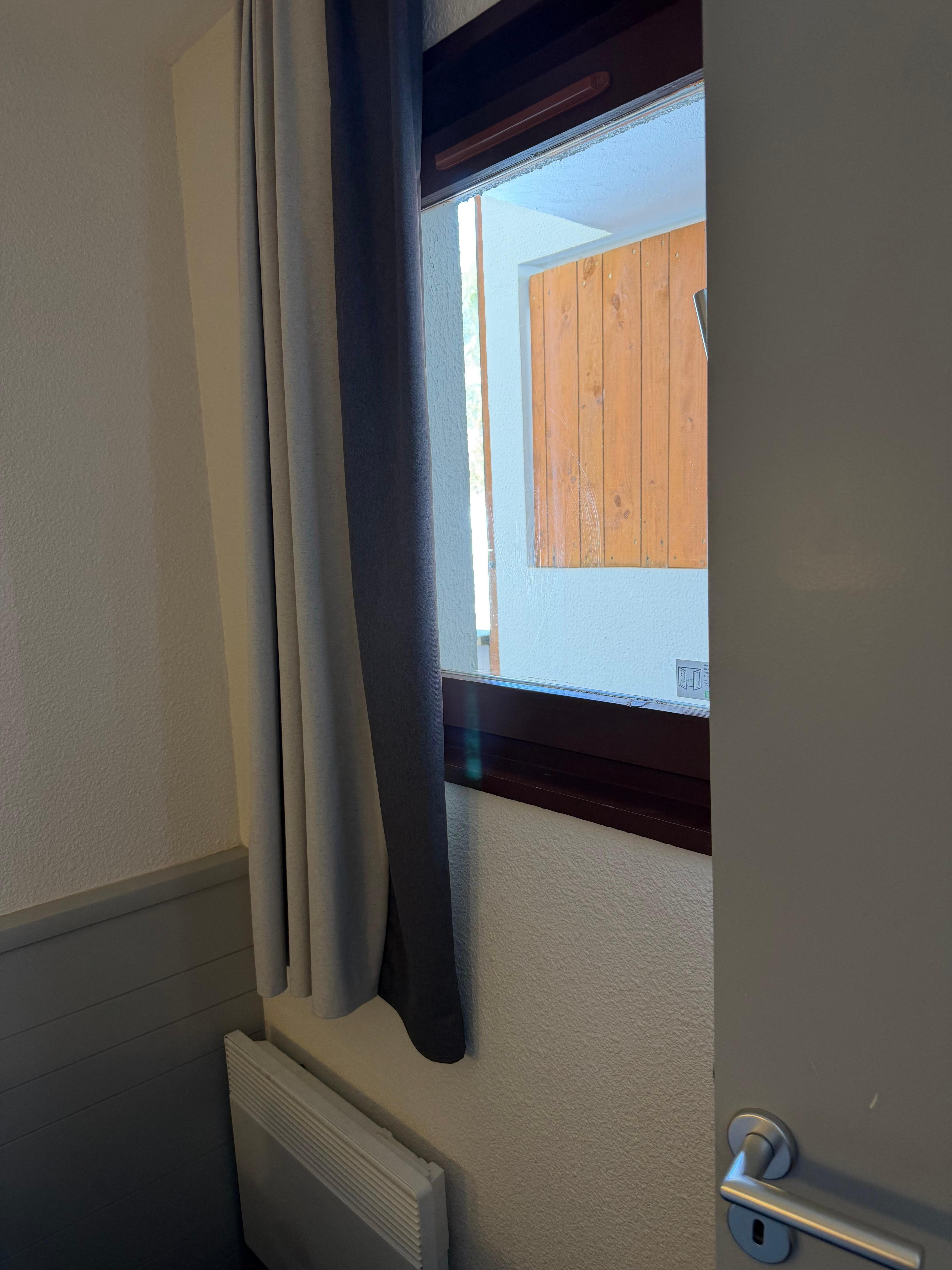 Bedroom window onto the corridor