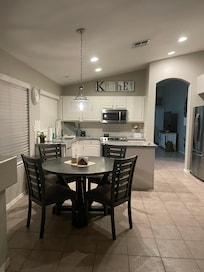 Open kitchen/ dining area.