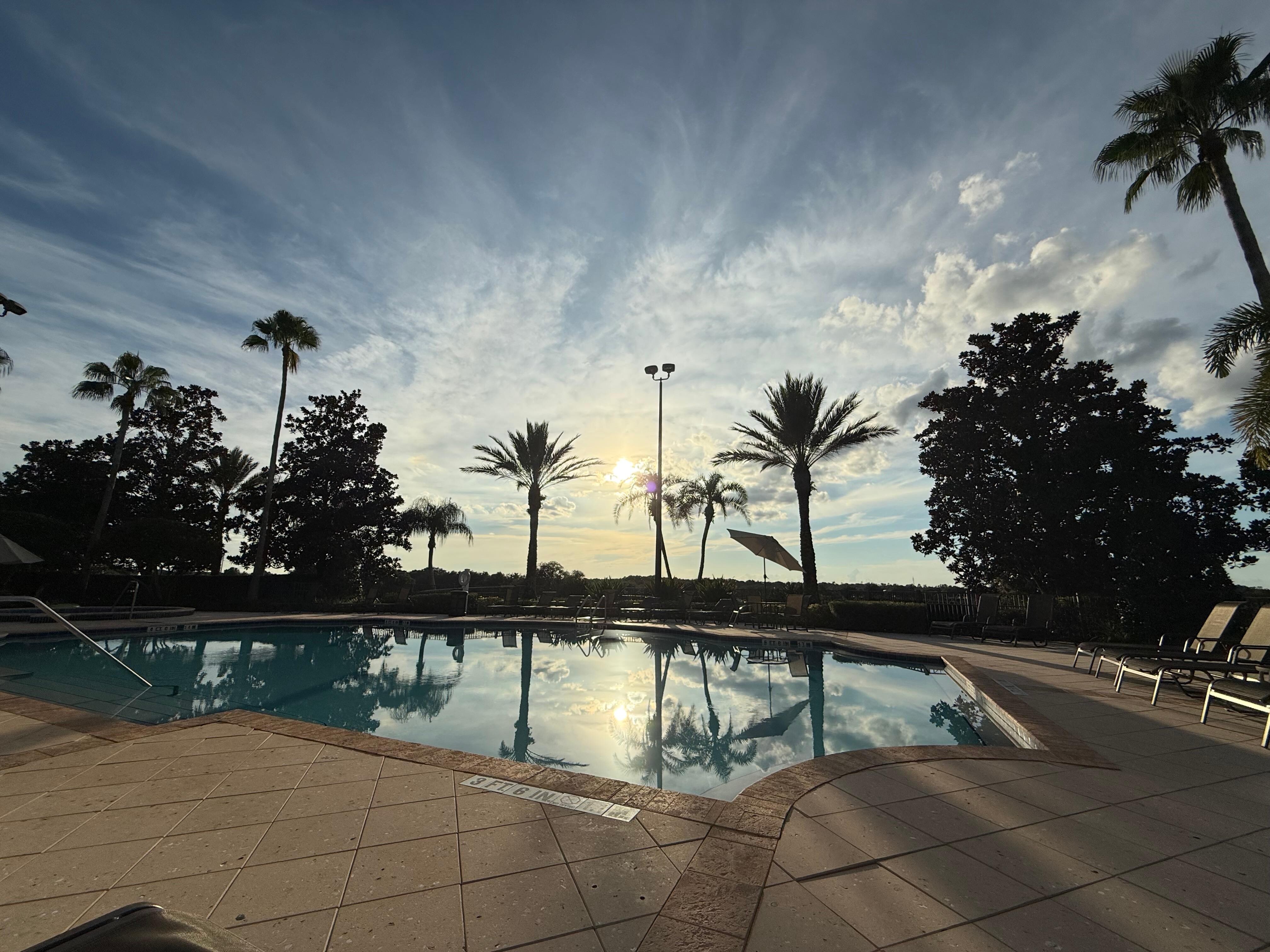 sunset by the pool