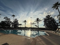 sunset by the pool