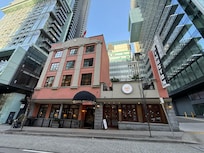 A refuge on a street of architectural giants.