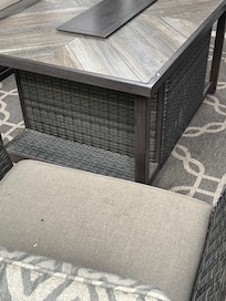 Side patio furniture with bird poop on it