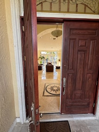 Entrance looking in through the house to the pool