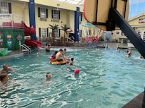 Main pool and kiddie pool in the back