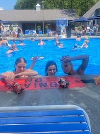 Girls having fun at the pool.
