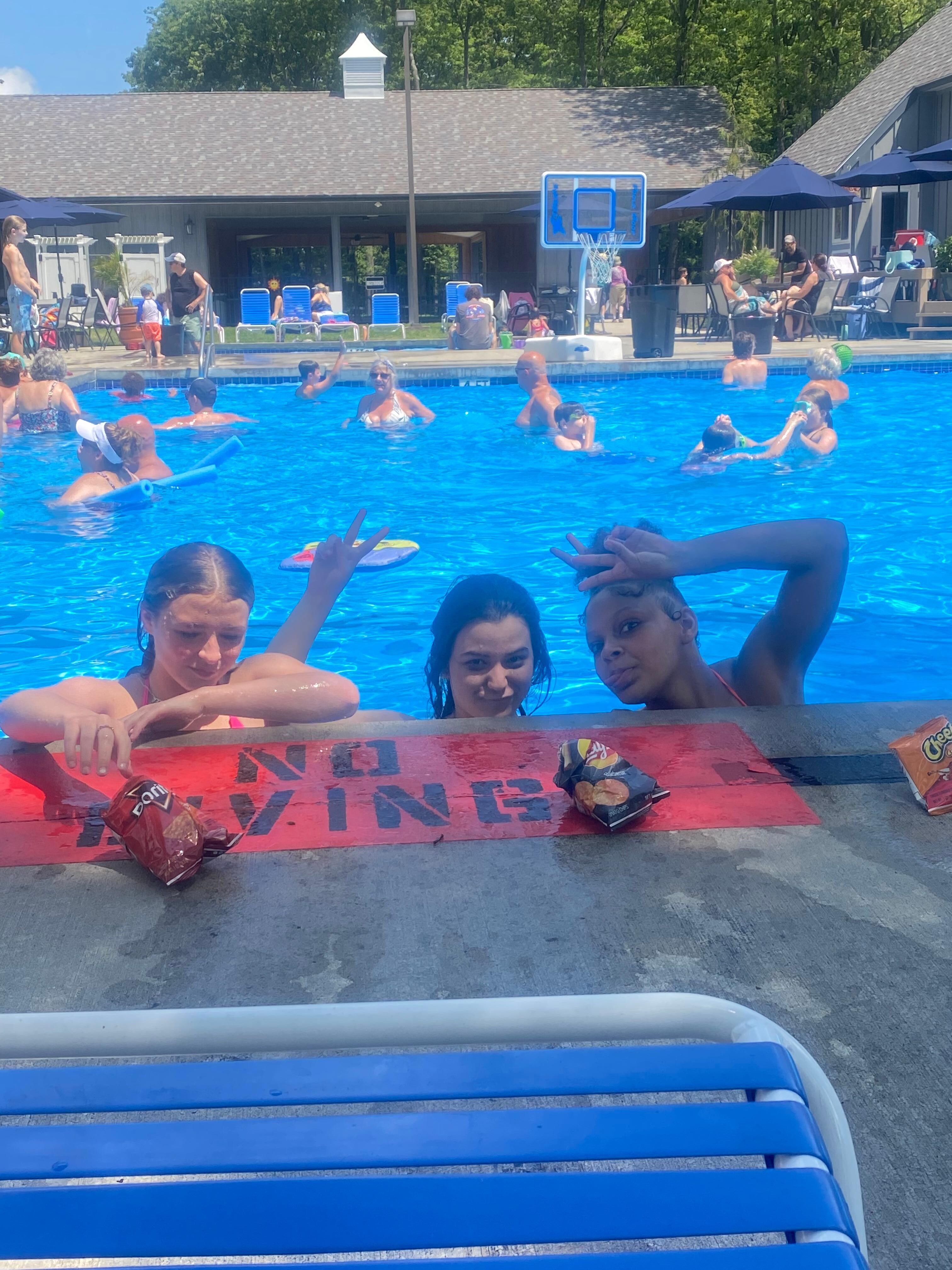 Girls having fun at the pool. 
