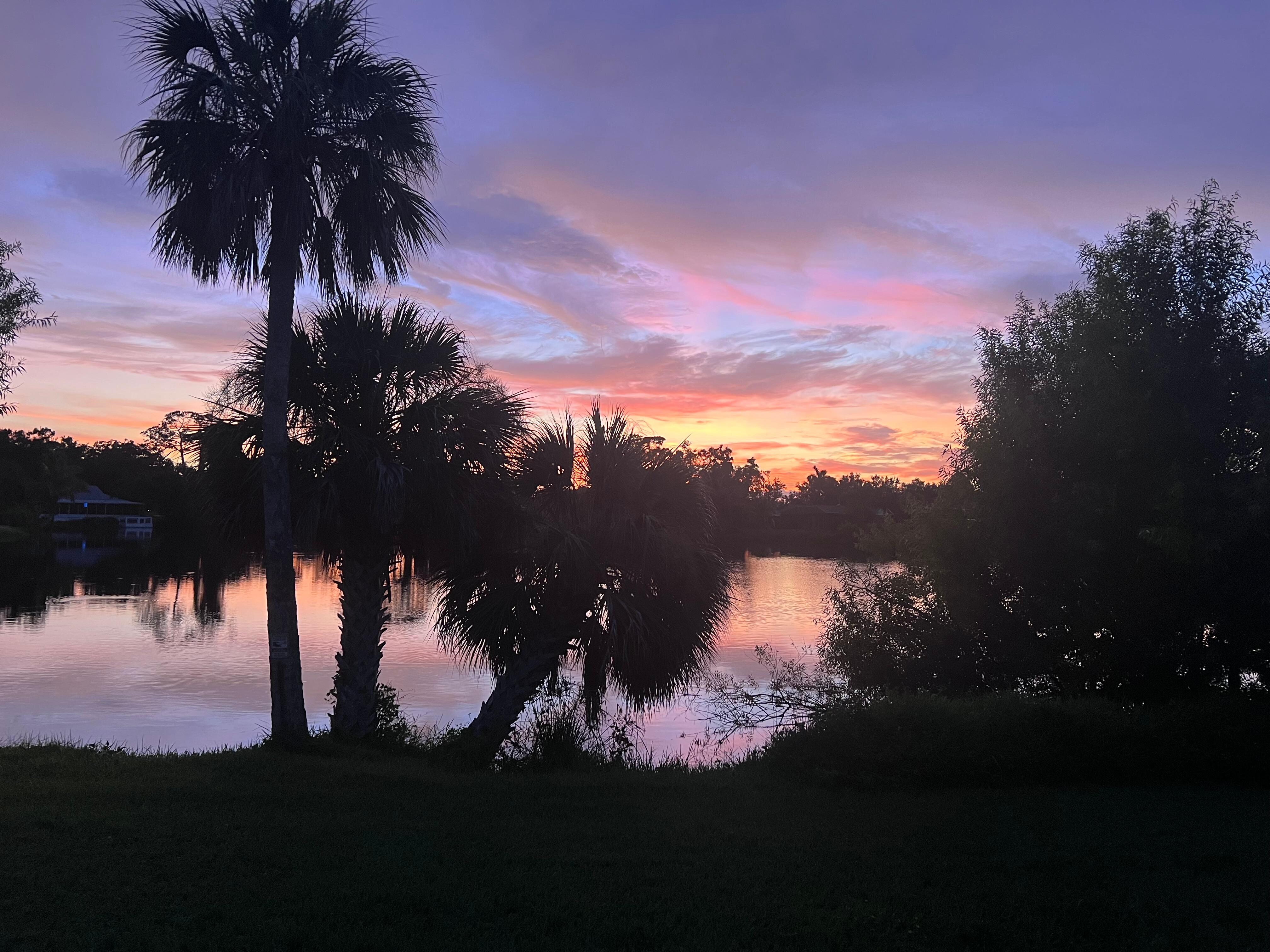 Sunset over the small lake at the back of the house