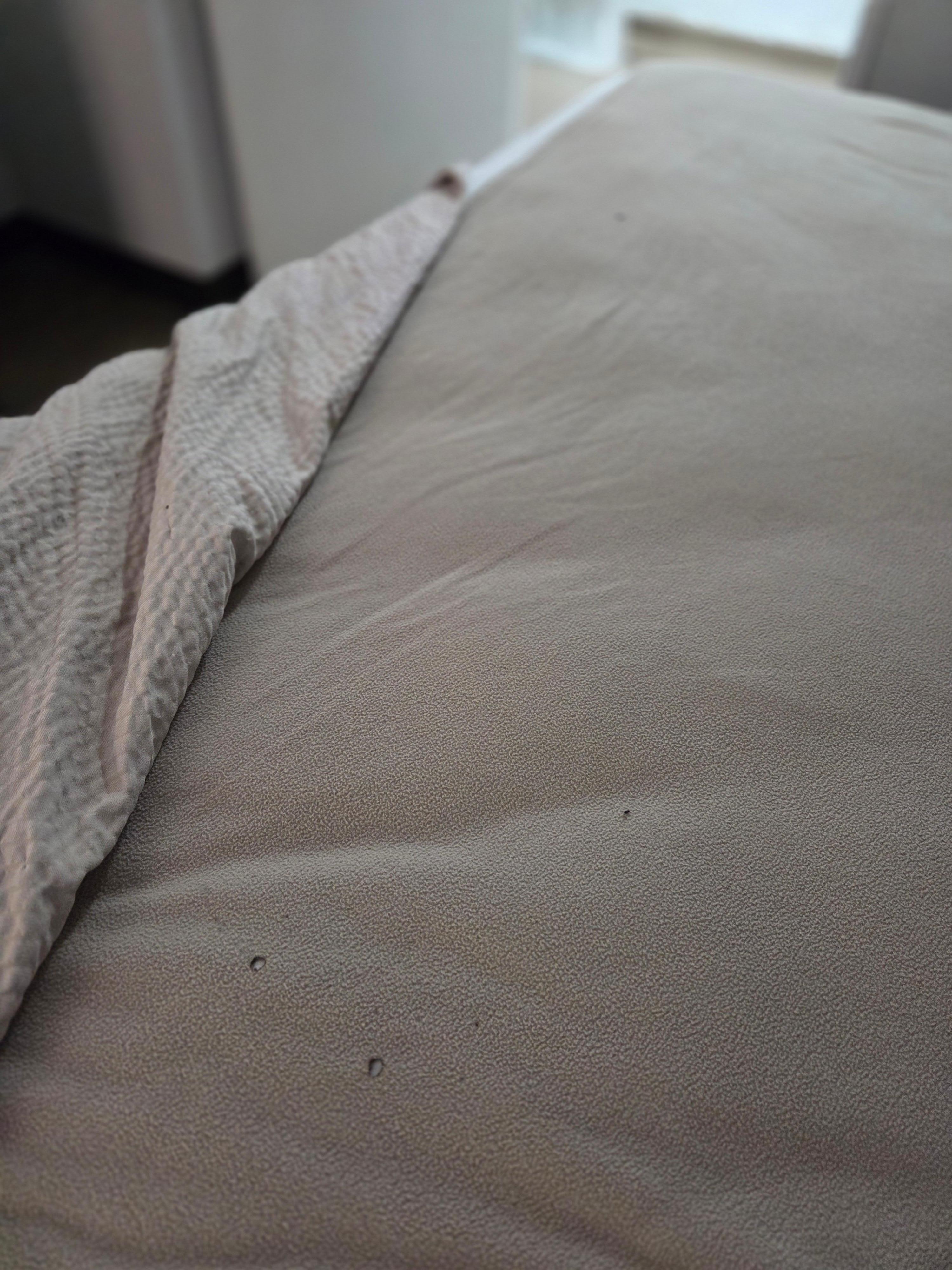 Cigarette burn holes