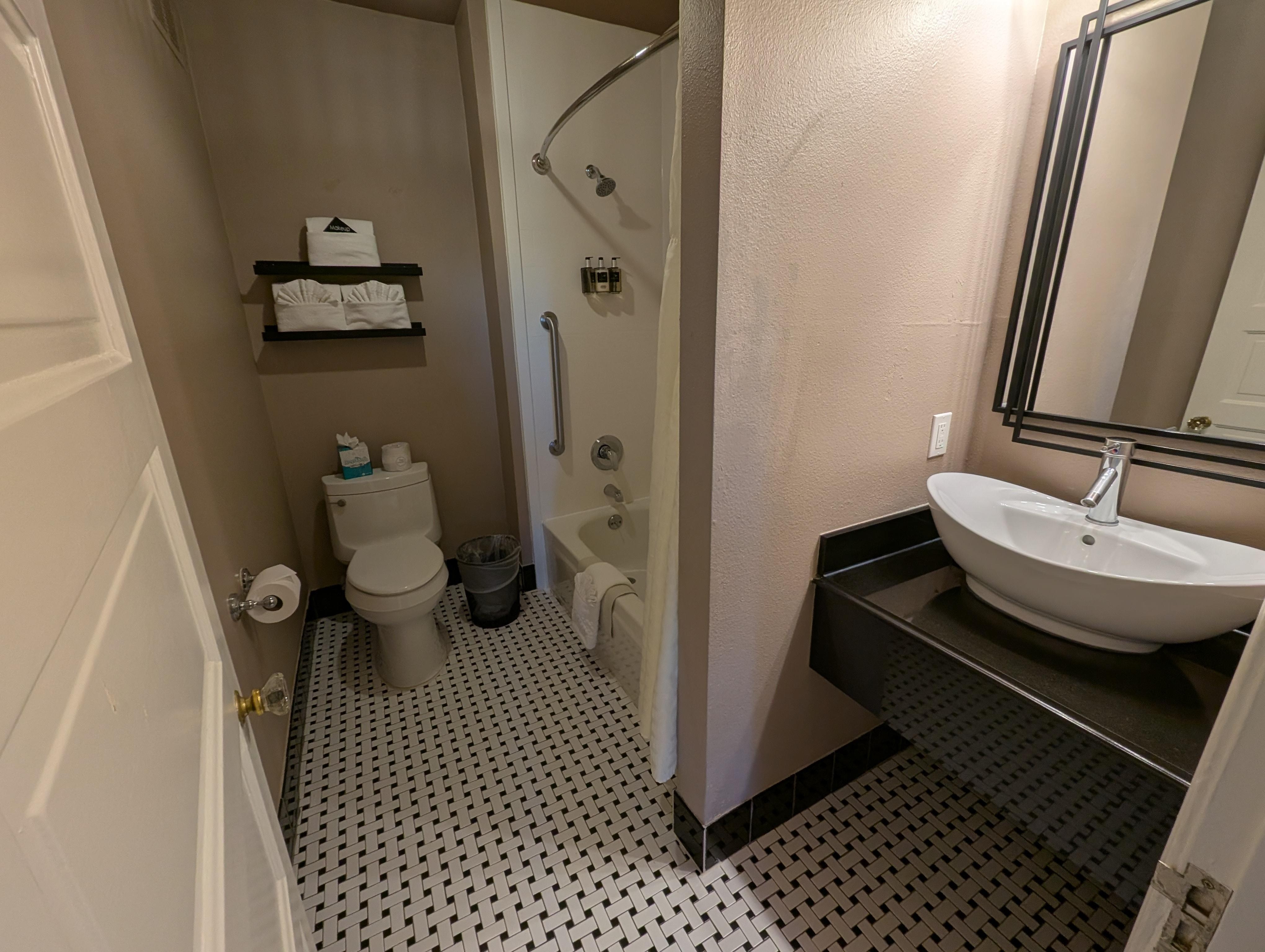 No vanity space or towel racks.