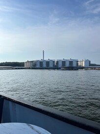 View of the condo complex from our dinner cruise. The main pool area is visible, with the individual condo unit around the right side.