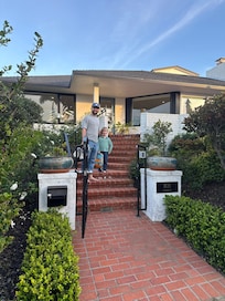 Front entrance with sidewalk and perfect neighborhood