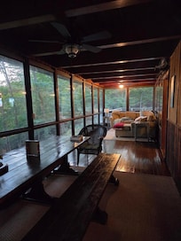 Lakeside rooms. Dining and couch area