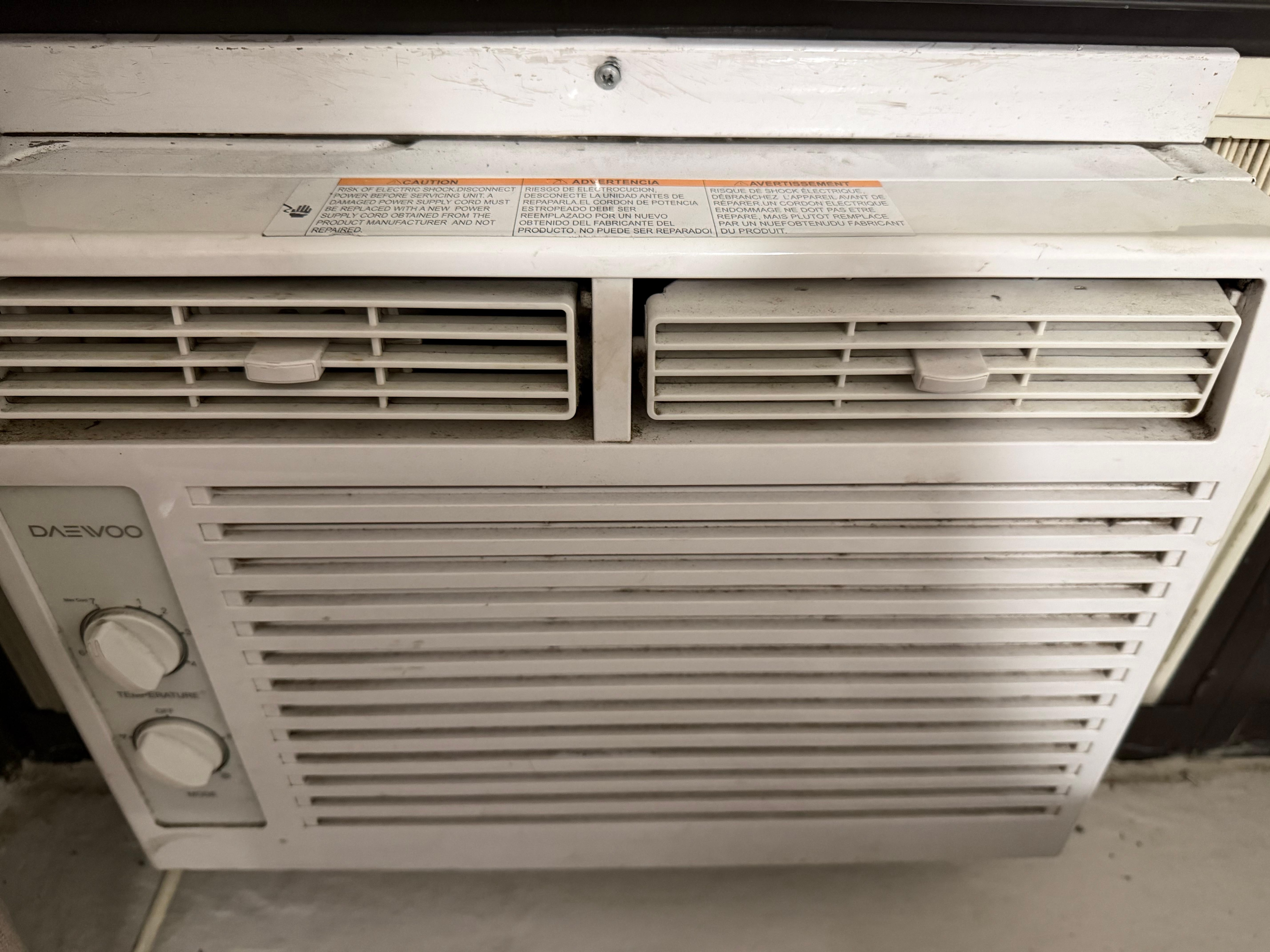 Broken and dusty AC 