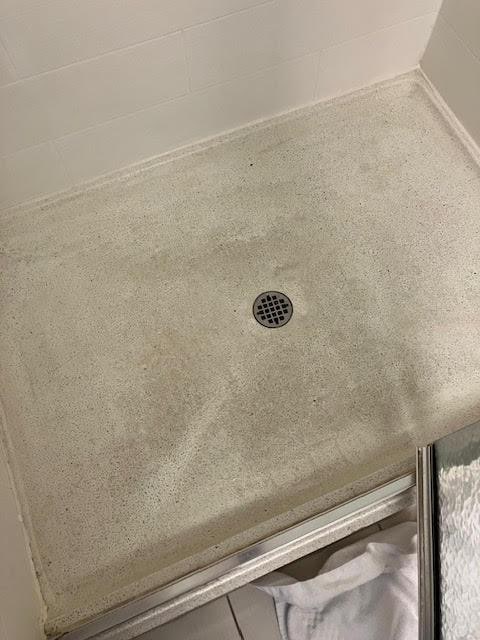Dingy or Worn out shower floor...