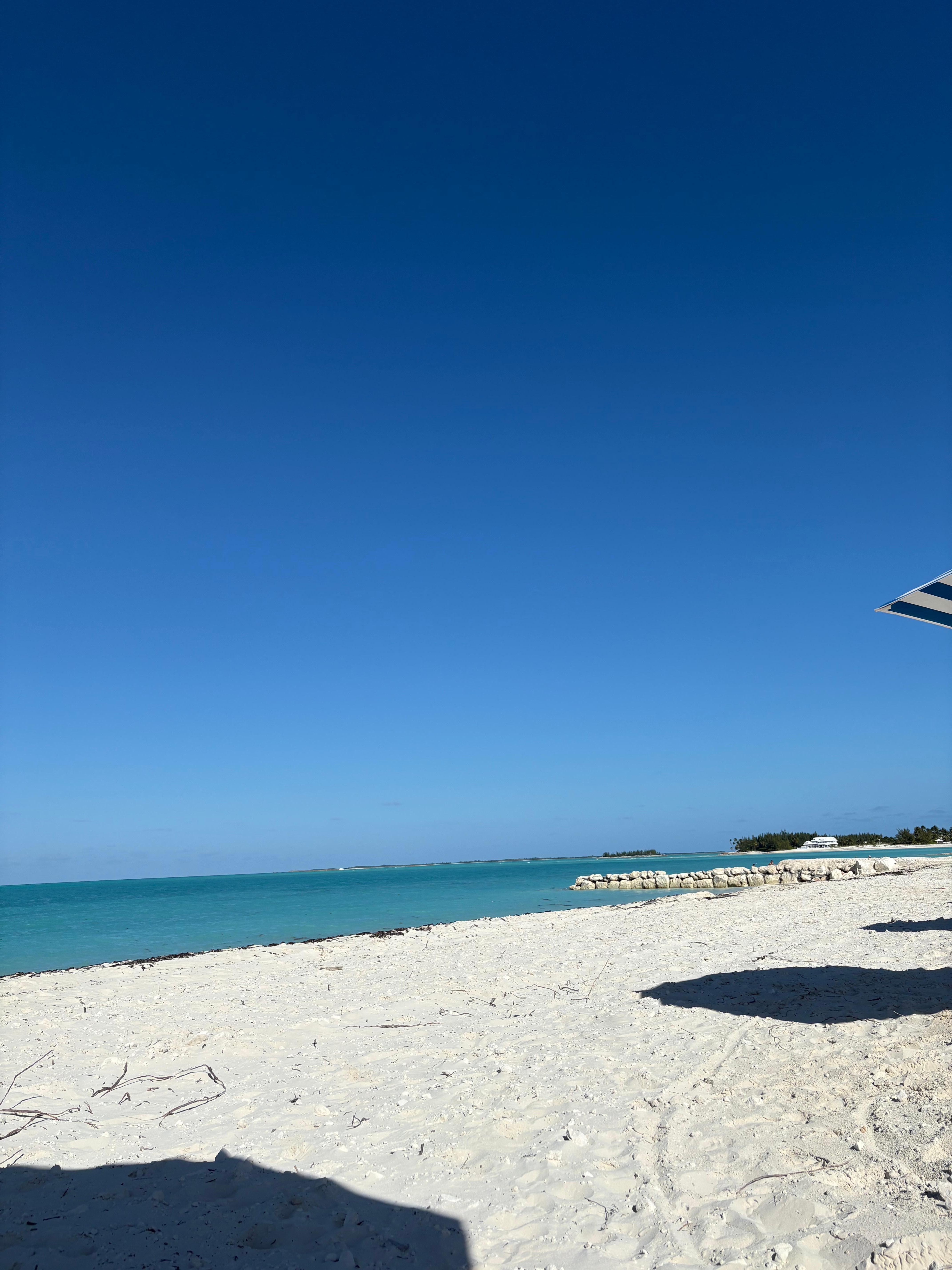The beach with chairs.