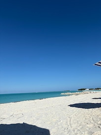 The beach with chairs.