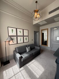 Sofa bed in the deluxe king room.