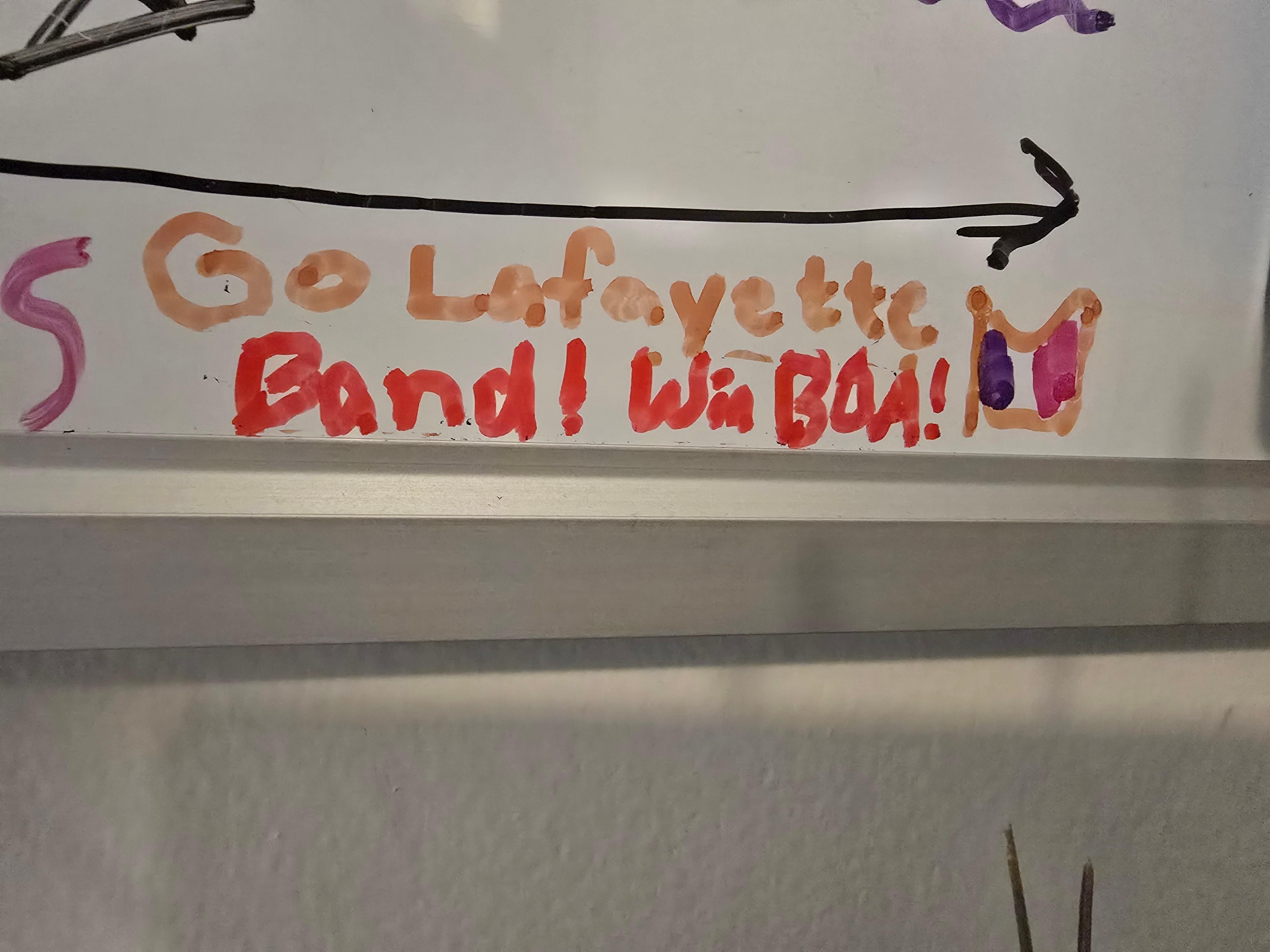 Cute whiteboard just off the laundry room for guests to leave messages!