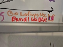 Cute whiteboard just off the laundry room for guests to leave messages!