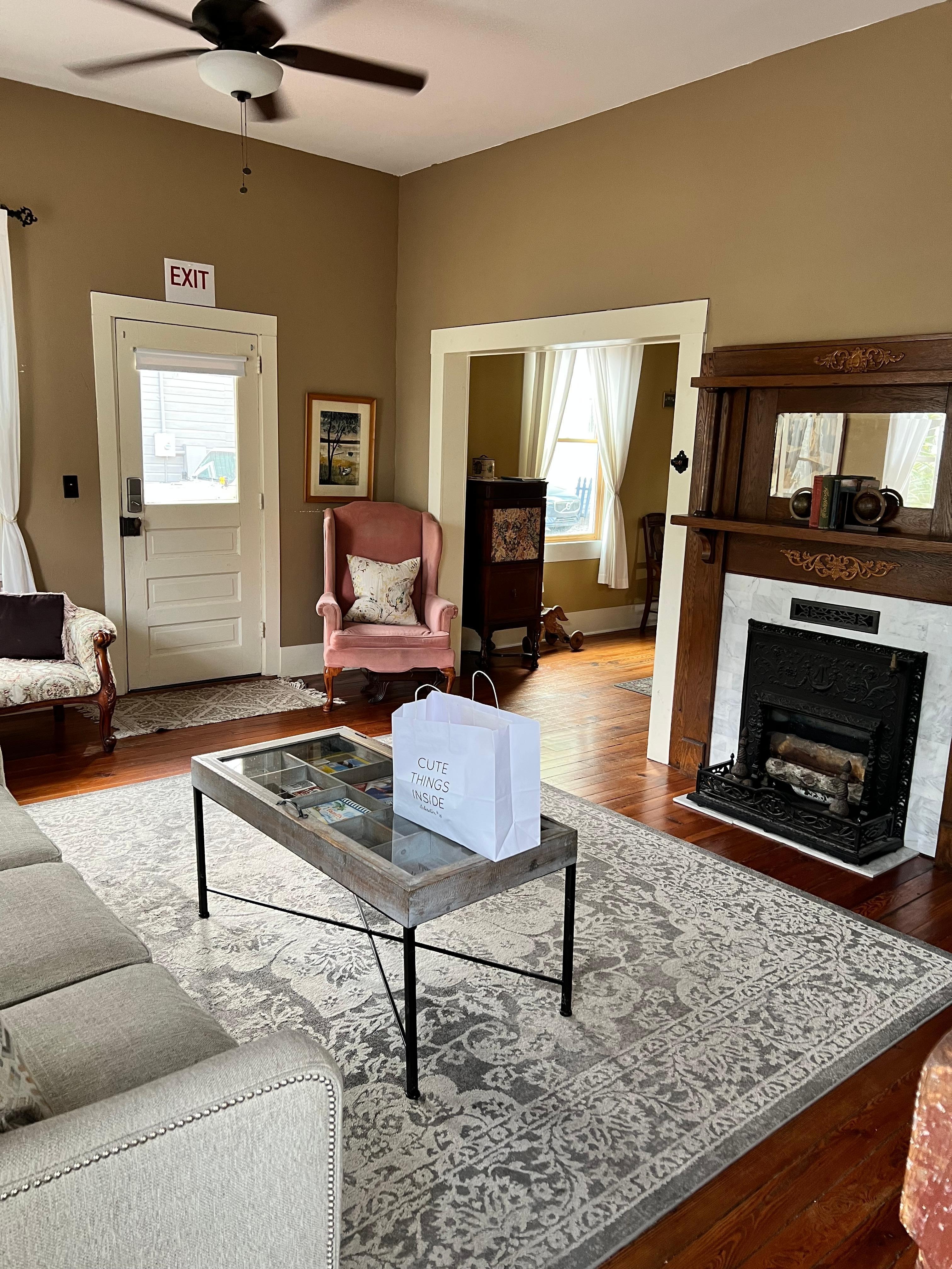 Standing at door looking into the main living room 
Around the corner on first floor is kitchen and a bedroom with full bath 