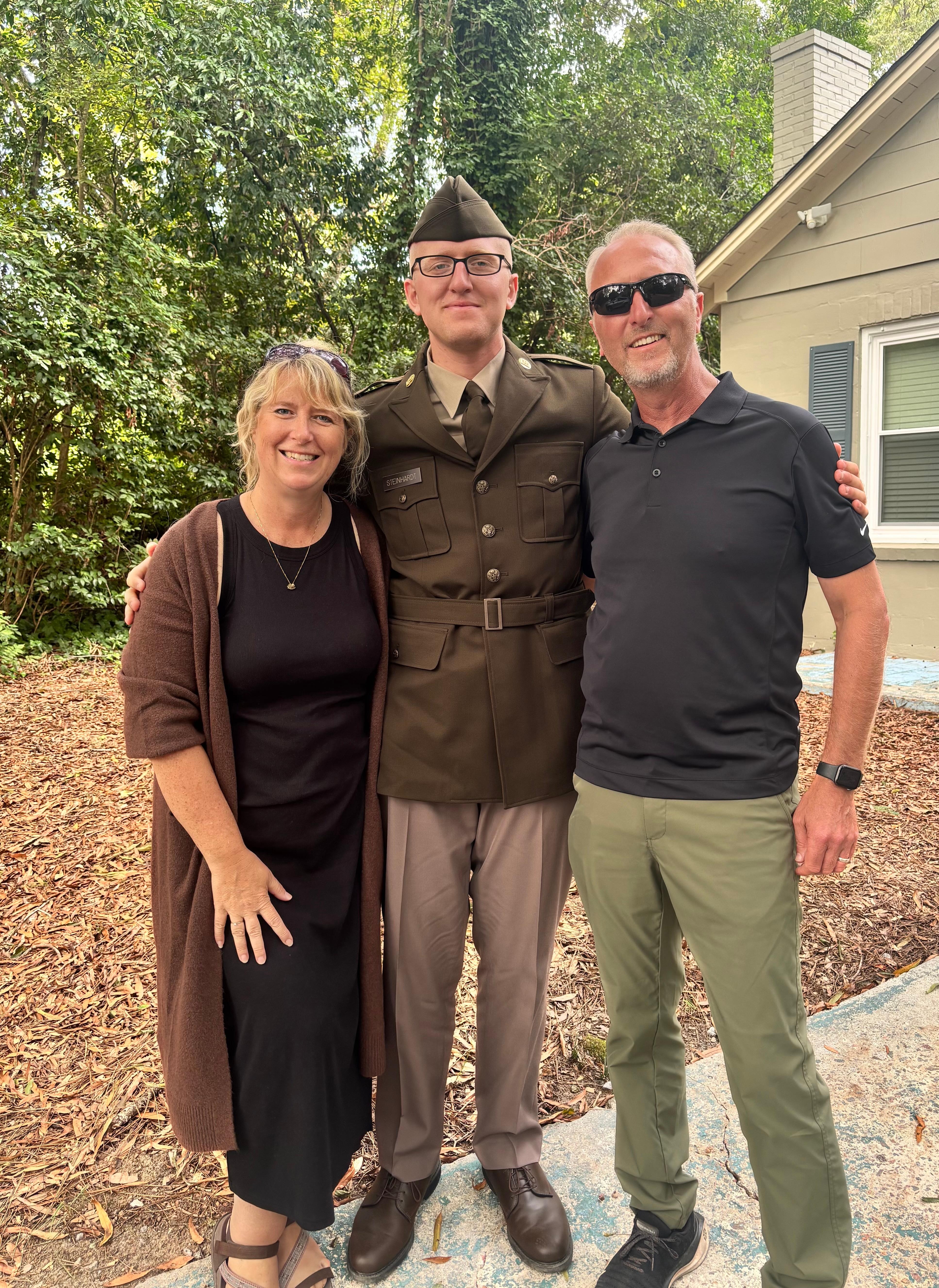 Graduation picture in the front yard of VRBO