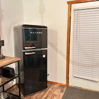 Refrigerator which was the newest and nicest thing in the cabin