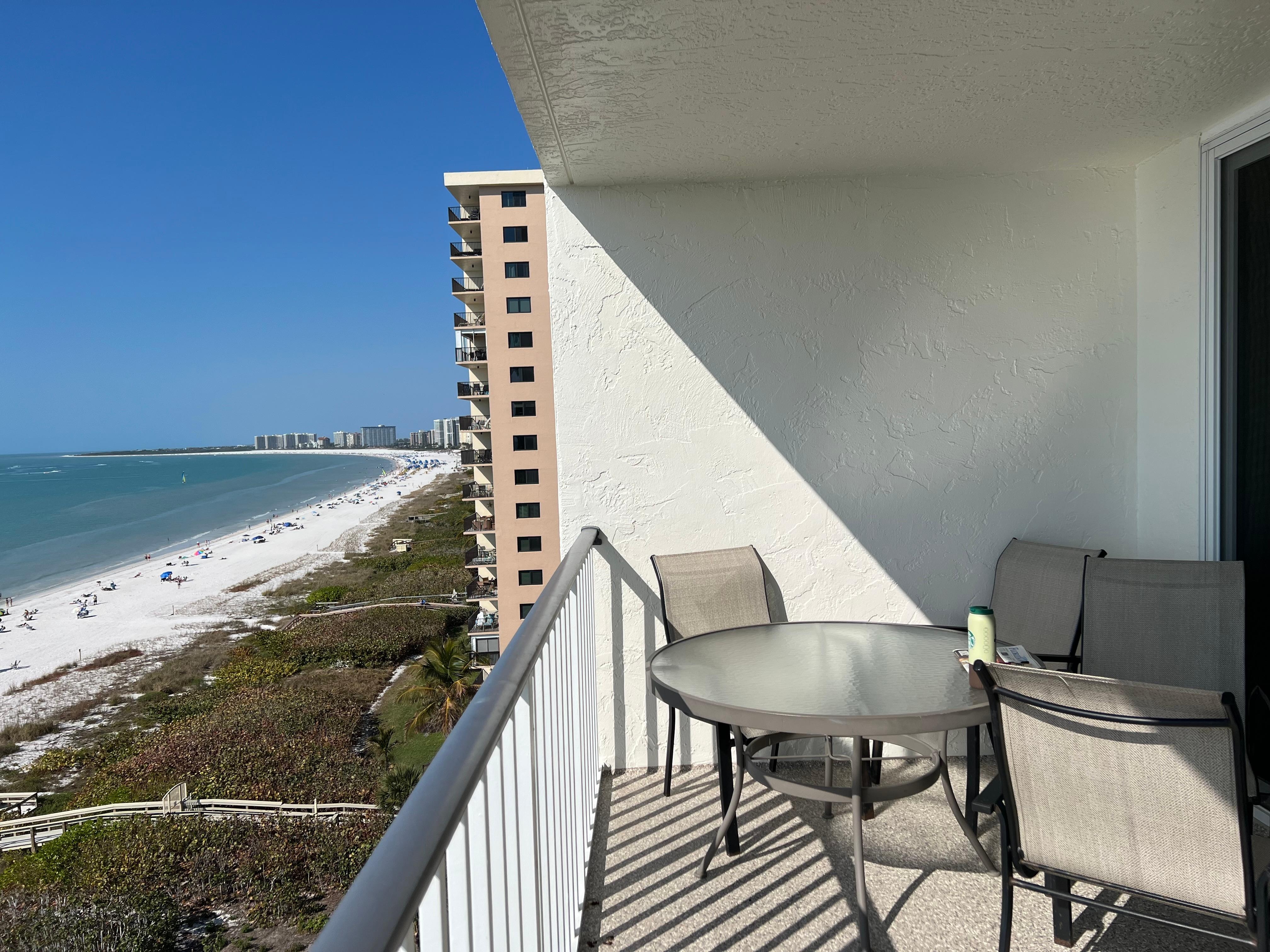A view of the balcony and down the coast. 