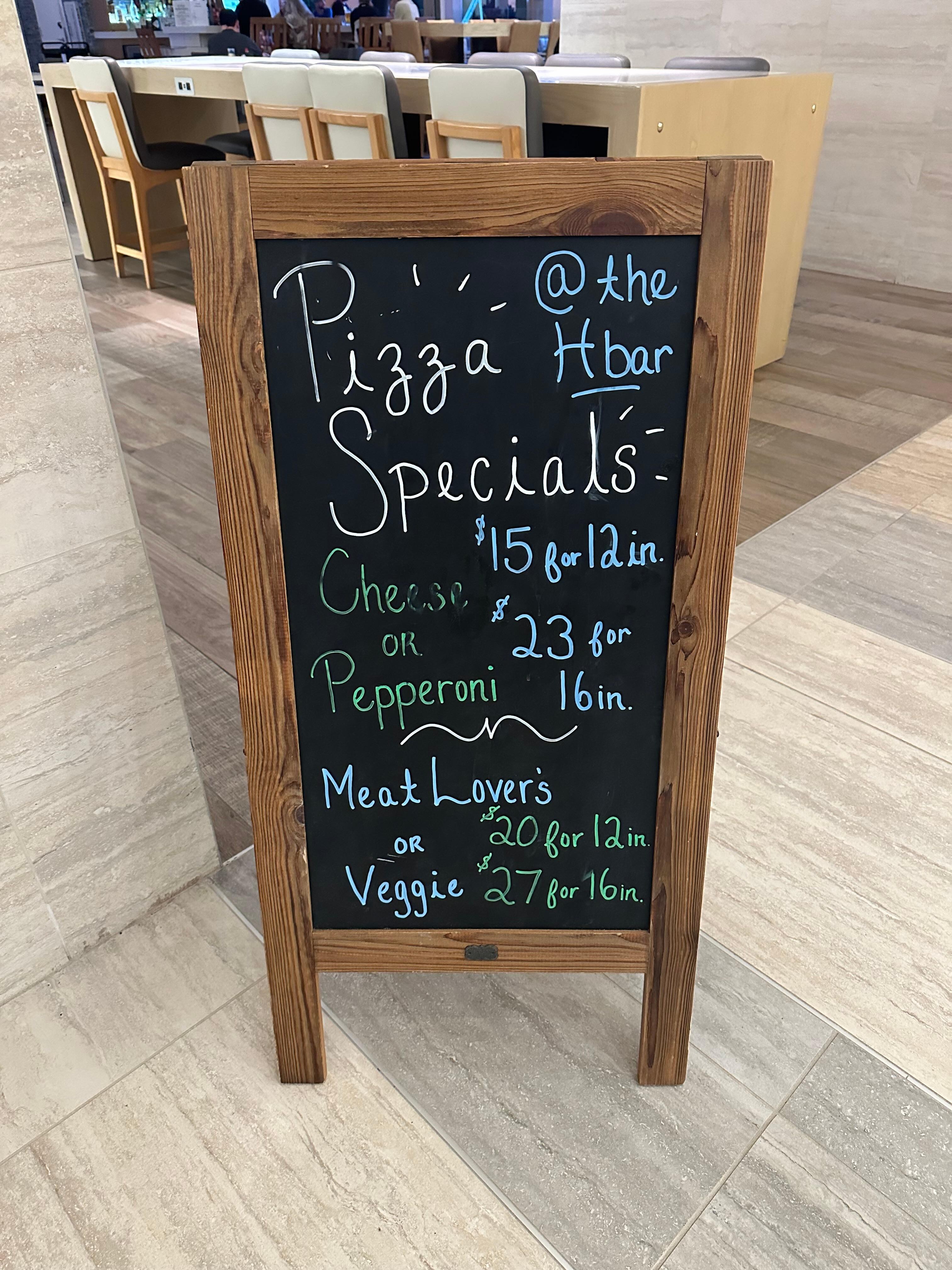 They offer typical bar food. Had special on pizza. 