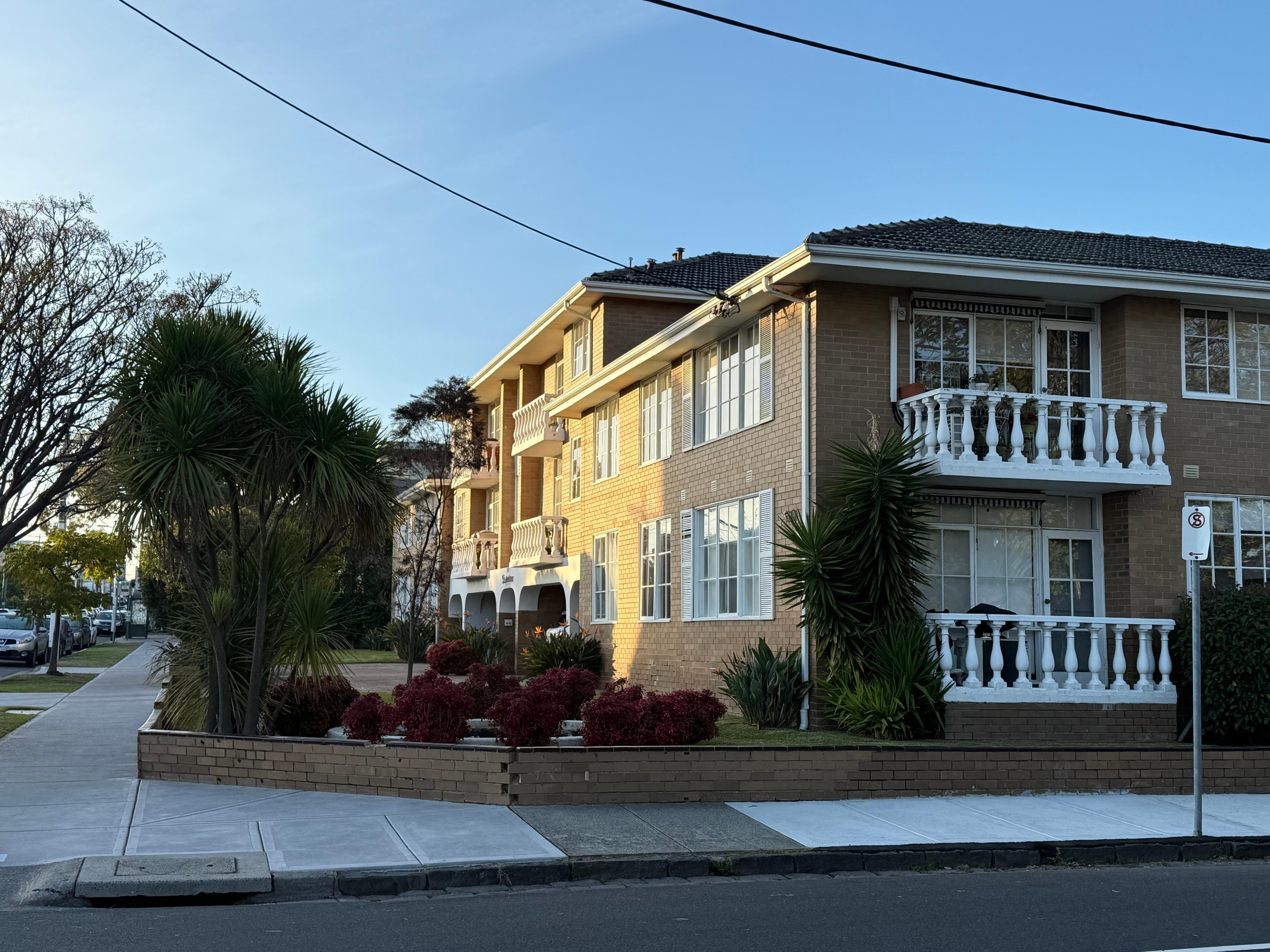 The apartment block. 