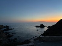 Sonnenuntergang über Bucht