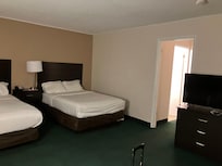 Two comfy beds and a third one on the next room.