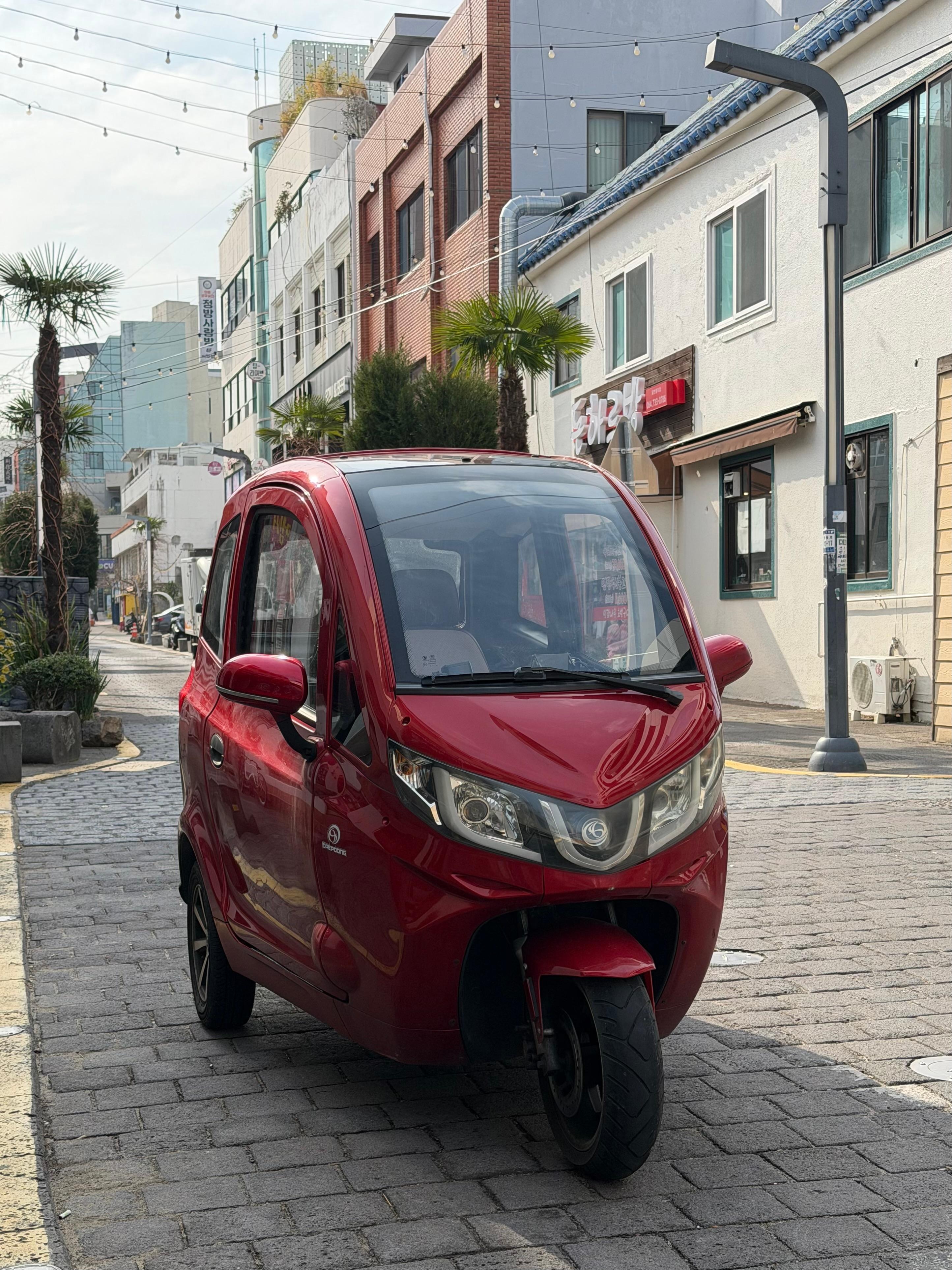 Cute vehicle nearby the property