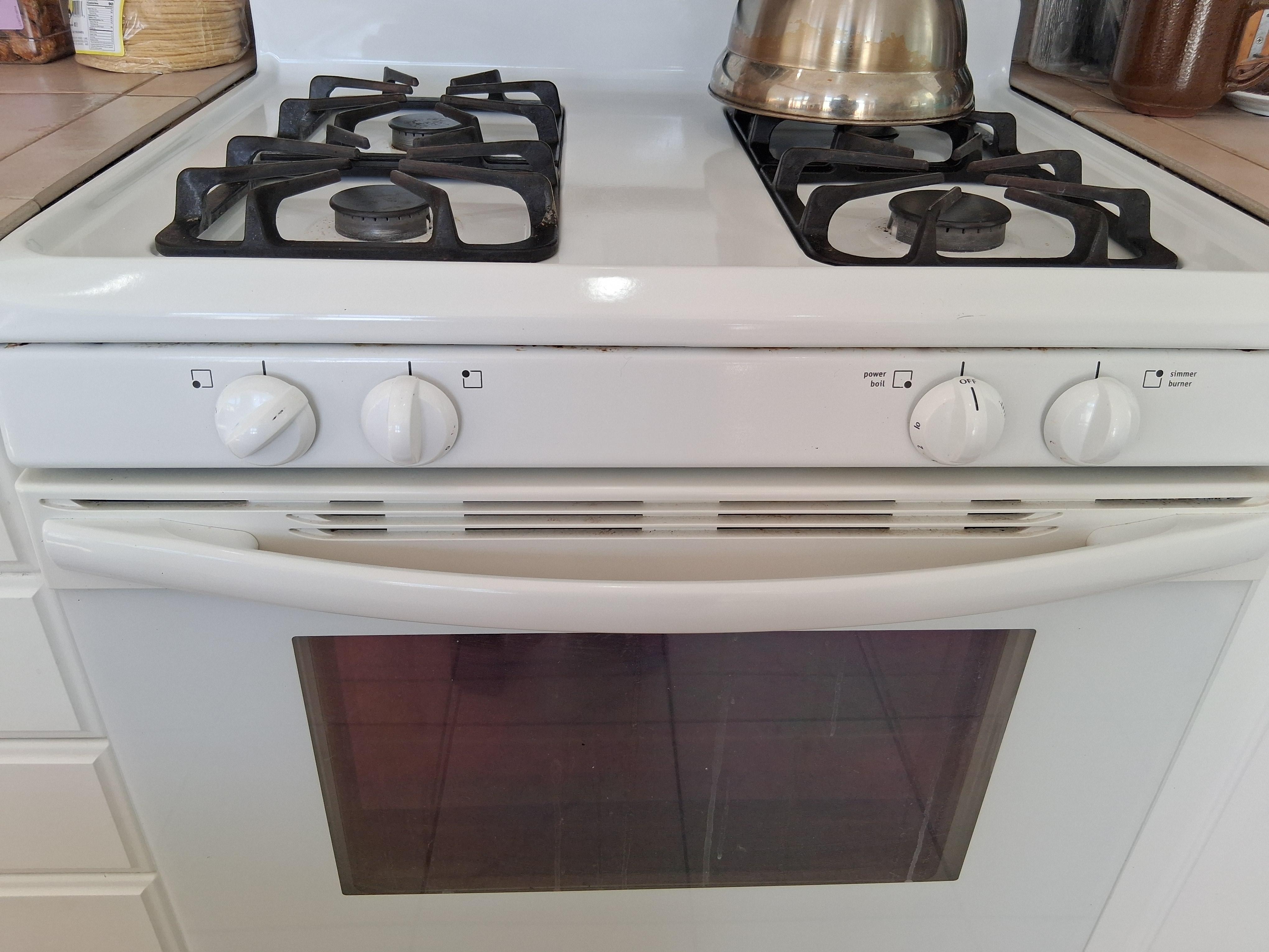 The left burner was after it got turned OFF. It was in the upright position leaking gas out. 