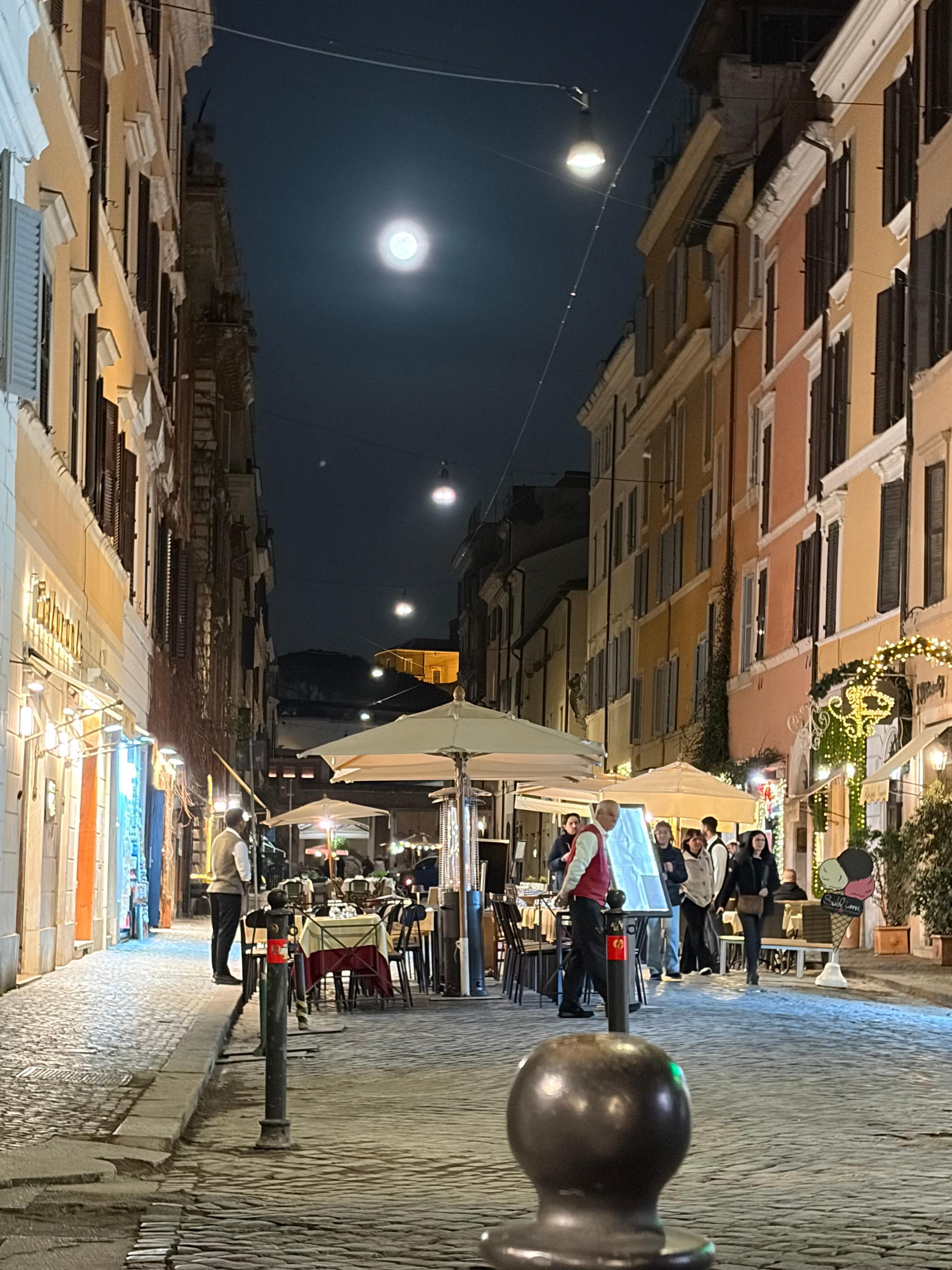 The street life outside the property at night!