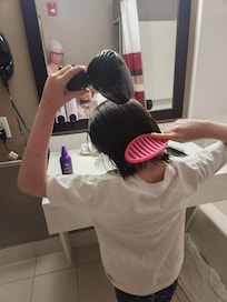 She loved the hairdryer thought it was really cool it was on the wall in the bathroom